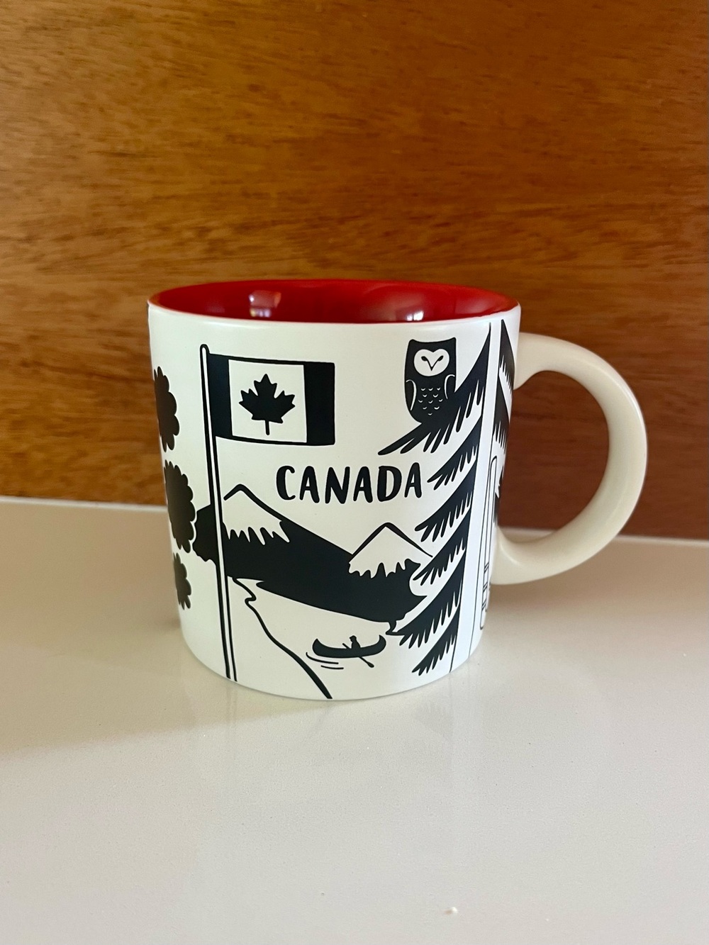 Indigo Canada Provinces of Canada 12 oz graphic ceramic mug in black, white, red